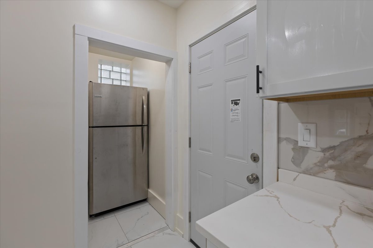 4626 West Monroe Street Chicago, IL 60644 - Photo 24 of 34 a bathroom with a shower and a bath tub