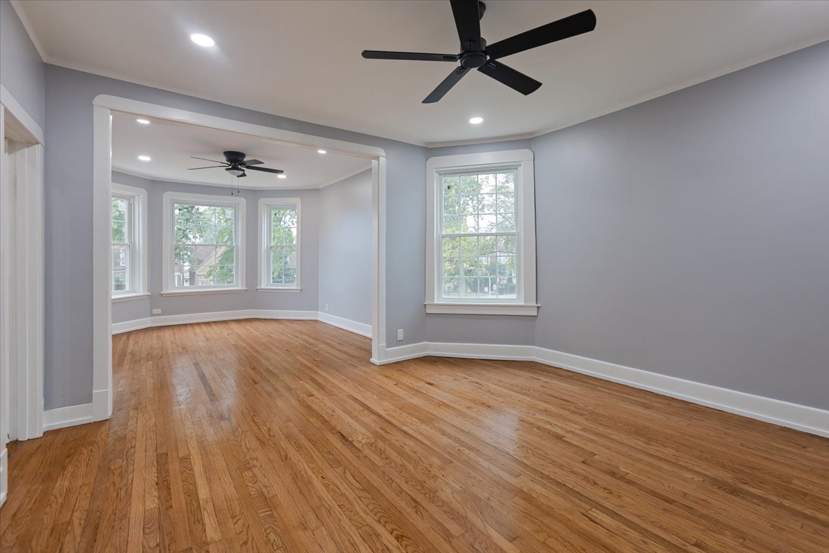 4626 West Monroe Street Chicago, IL 60644 - Photo 25 of 34 wooden floor in an empty room with a window