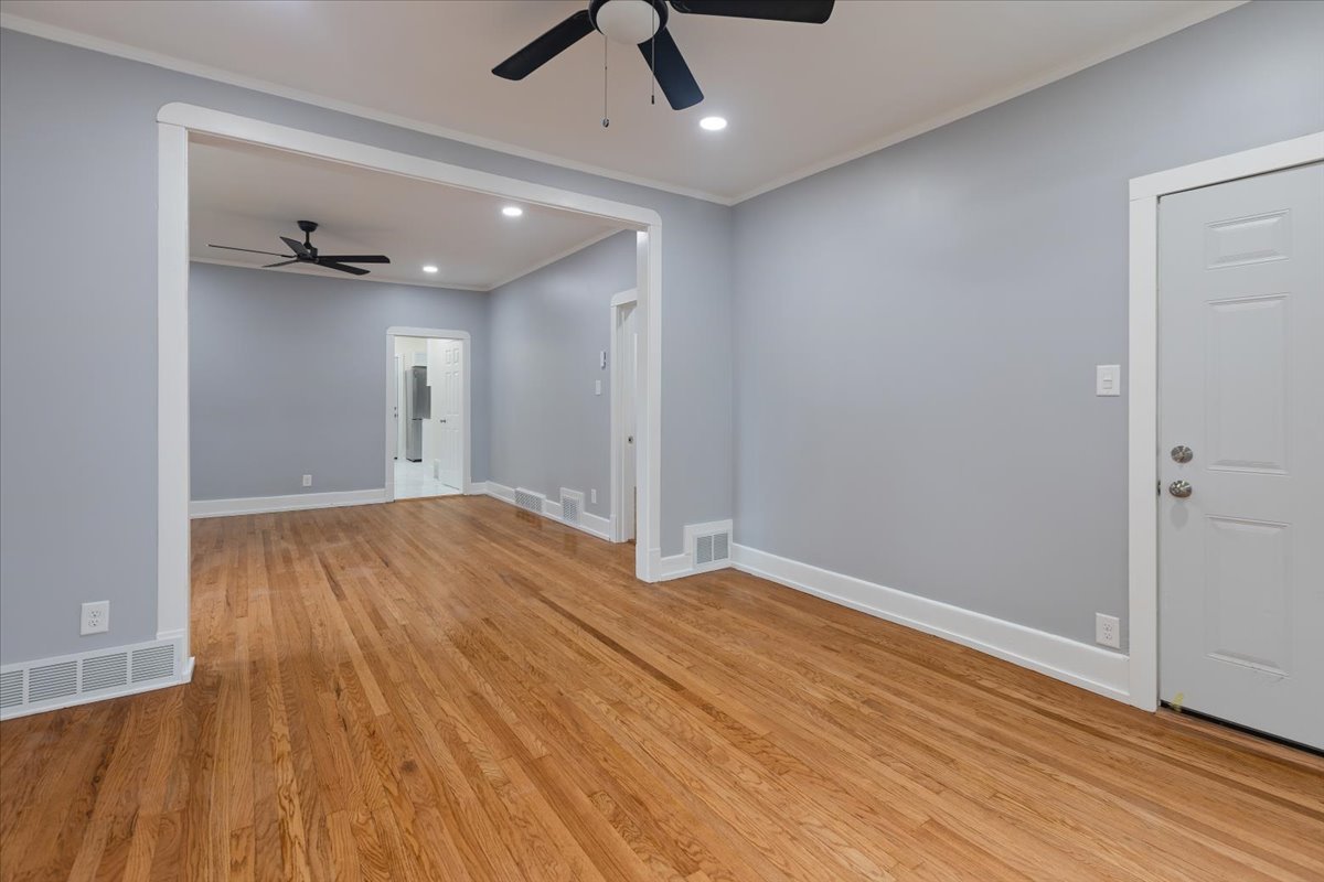 4626 West Monroe Street Chicago, IL 60644 - Photo 28 of 34 an empty room with wooden floor and windows