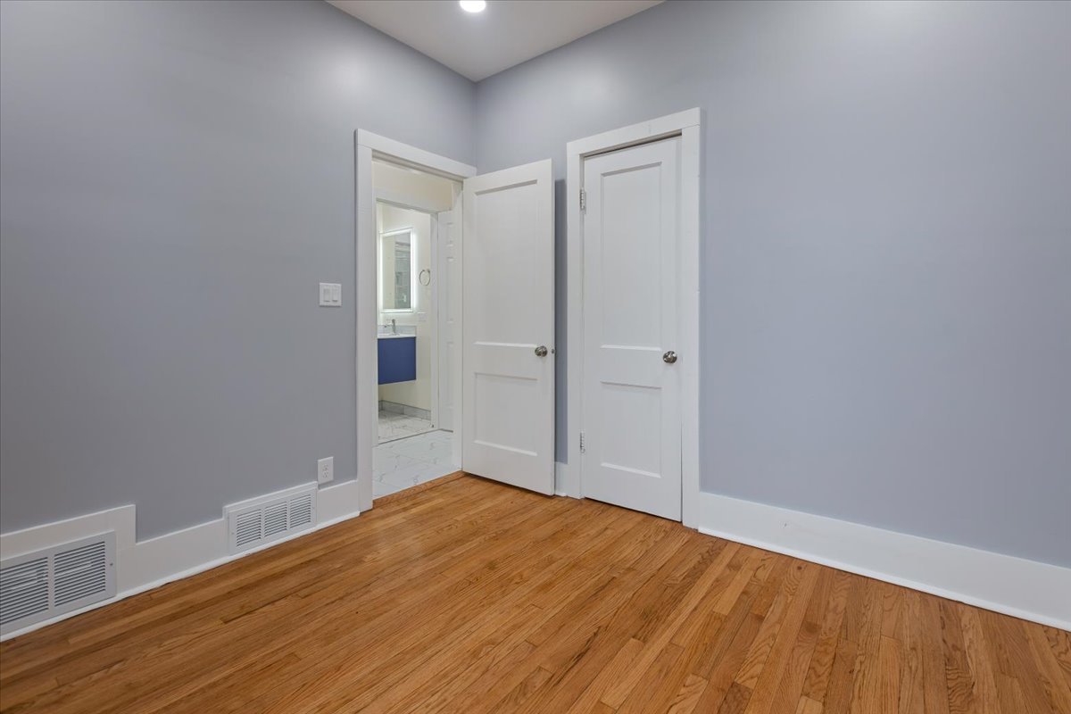 4626 West Monroe Street Chicago, IL 60644 - Photo 32 of 34 a view of empty room with wooden floor