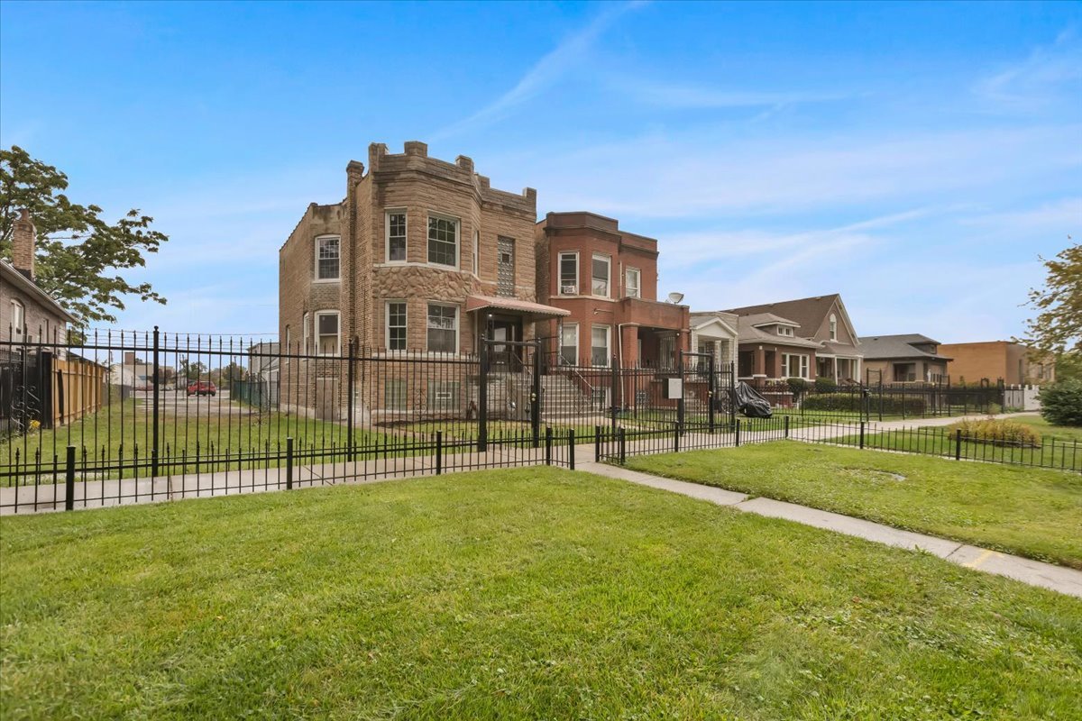 4626 West Monroe Street Chicago, IL 60644 - Photo 4 of 34 a view of a house with a big yard and a big yard