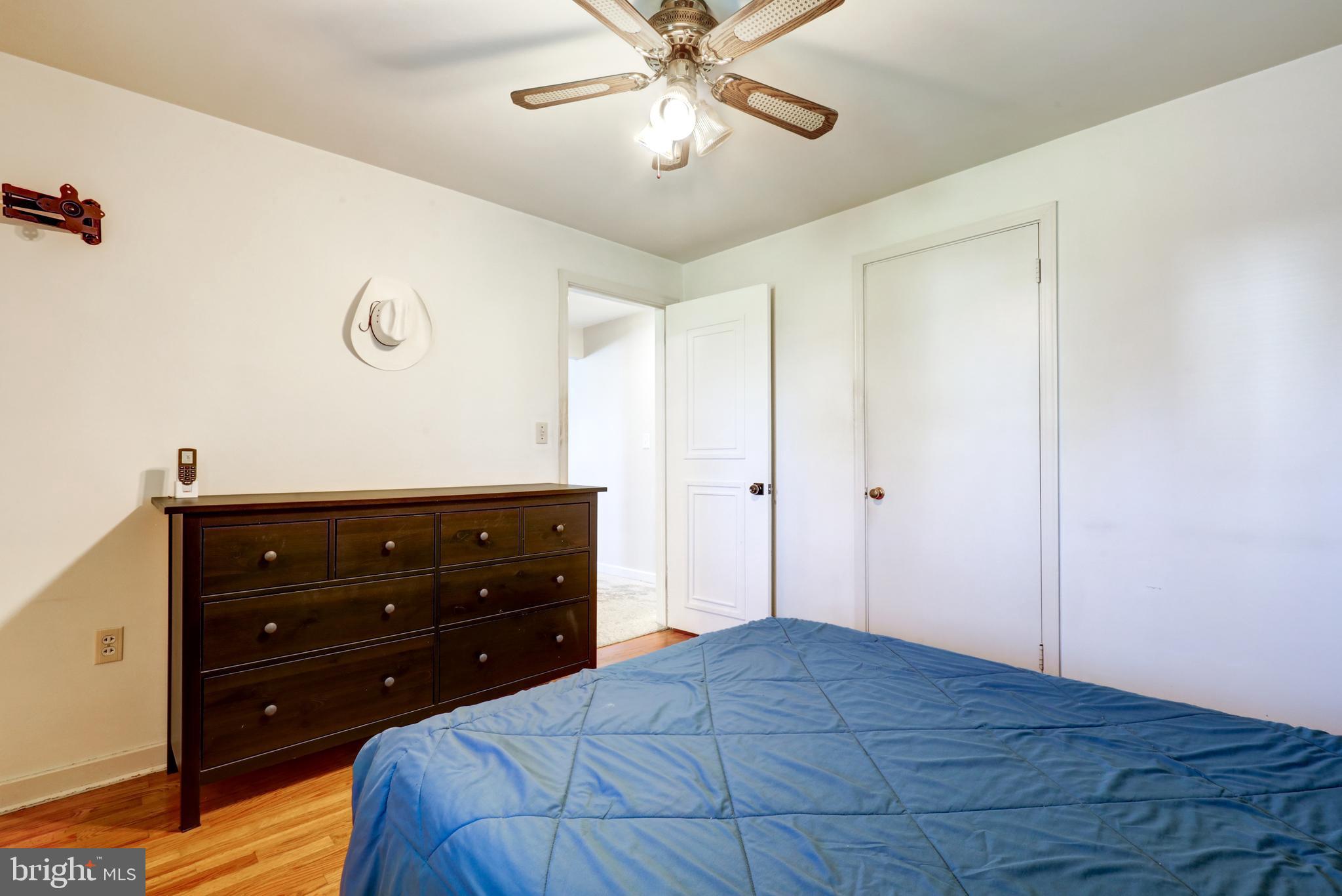 210 South 8th Street Akron, PA 17501 - Photo 13 of 31 a bedroom with a bed and a dresser