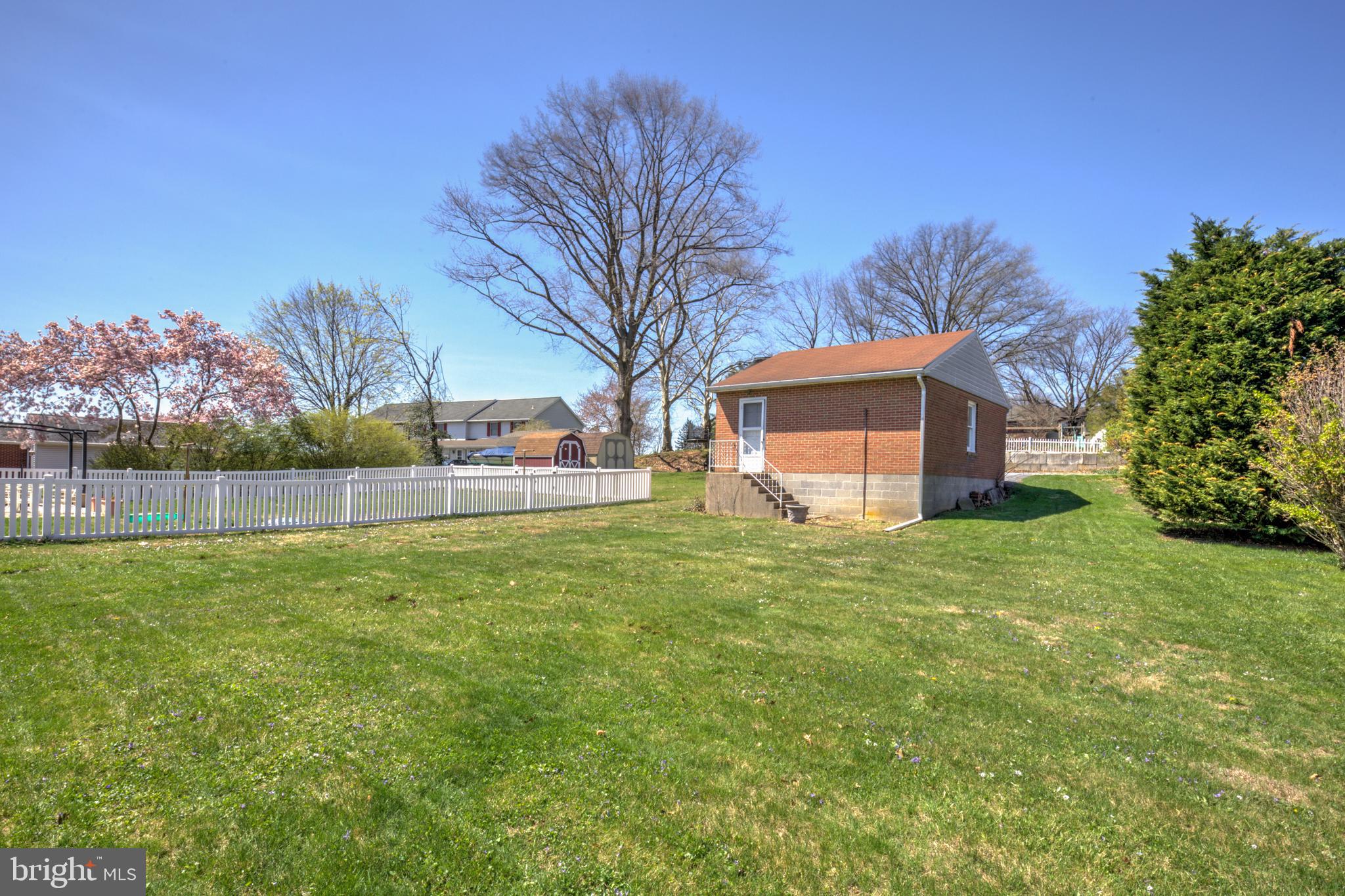210 South 8th Street Akron, PA 17501 - Photo 24 of 31 a house view with a garden space