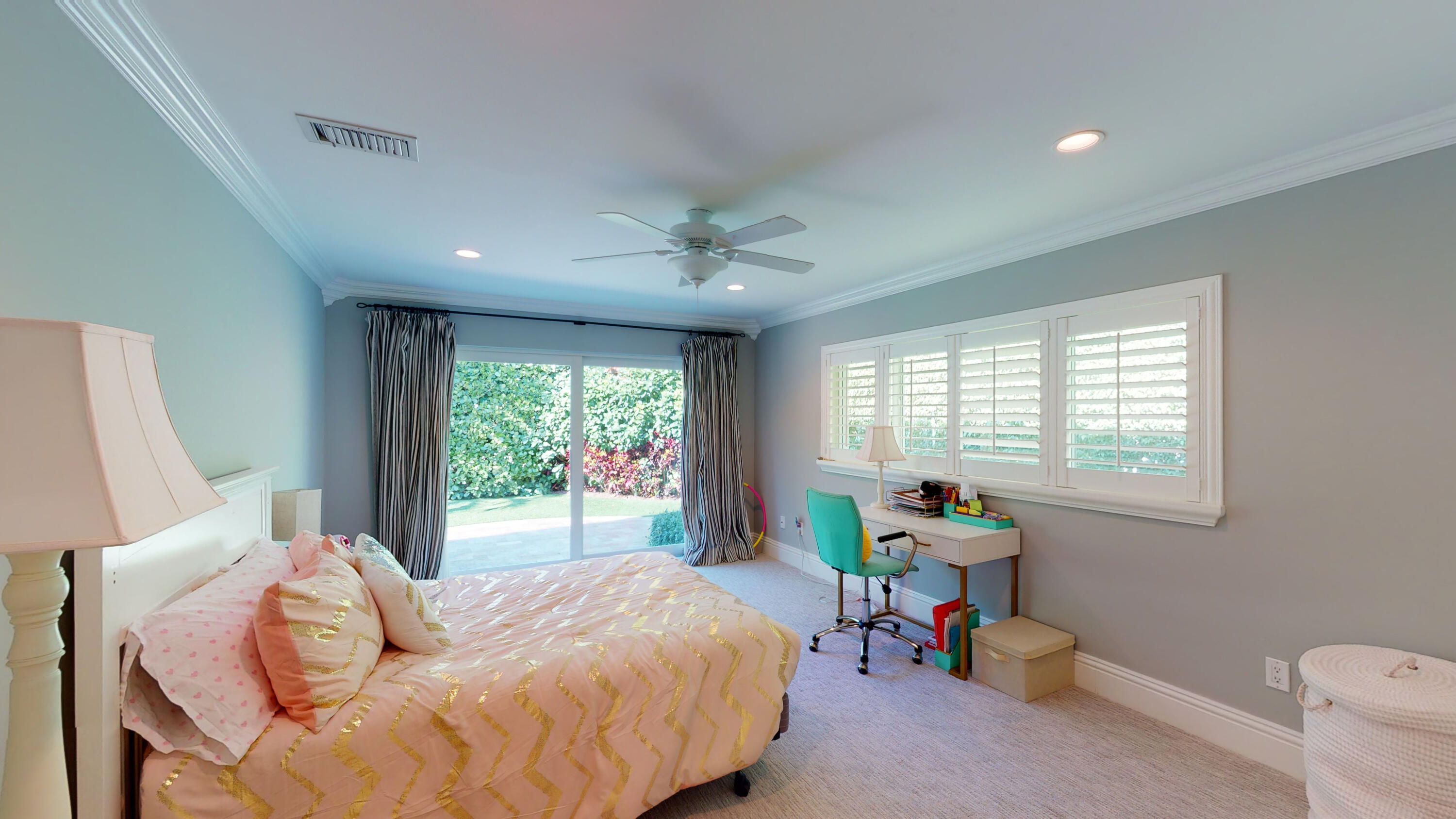 2255 Date Palm Road Boca Raton, FL 33432 - Photo 11 of 14 a bedroom with a bed and a chandelier