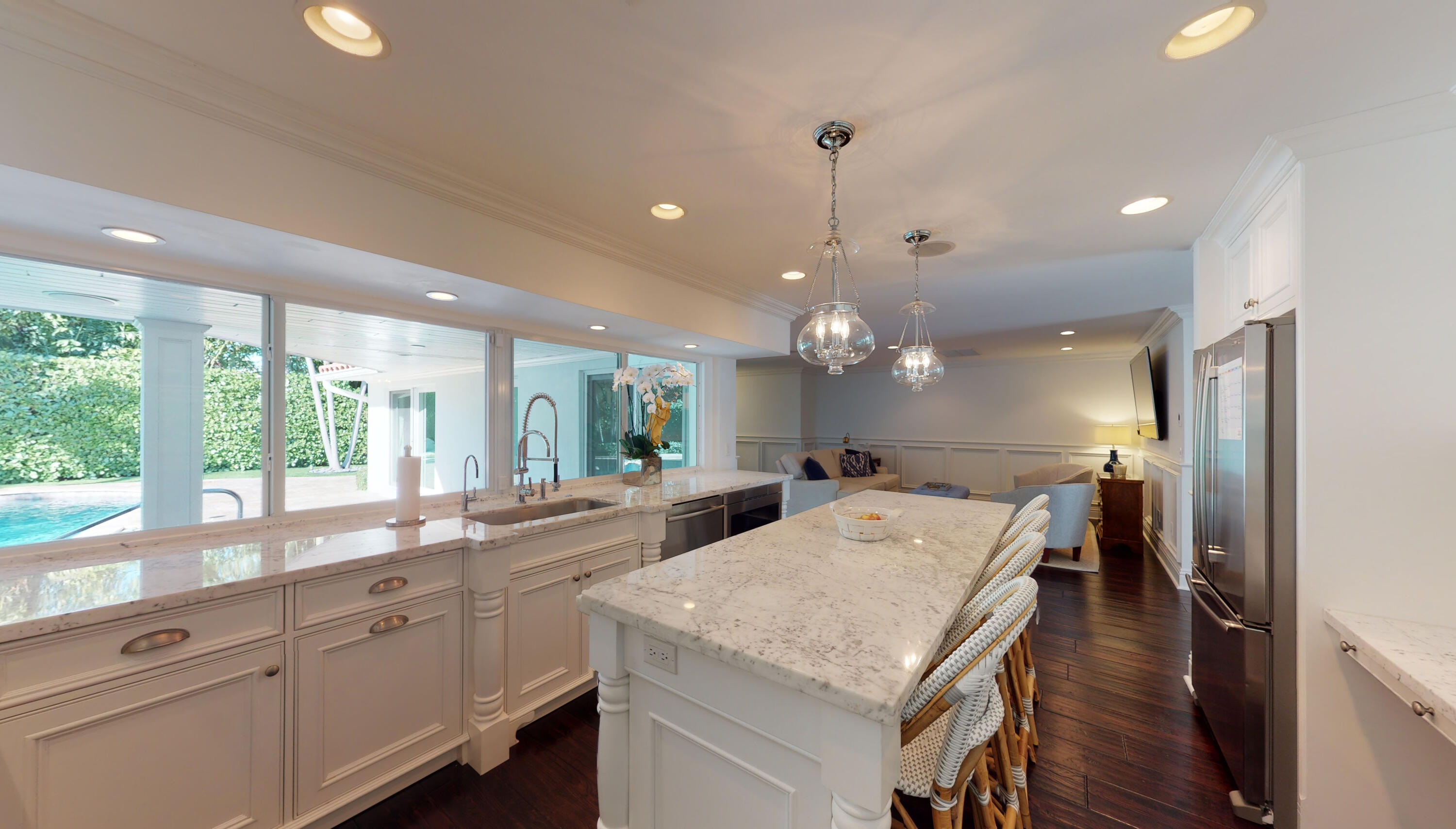 2255 Date Palm Road Boca Raton, FL 33432 - Photo 7 of 14 a large kitchen with kitchen island a large island in it