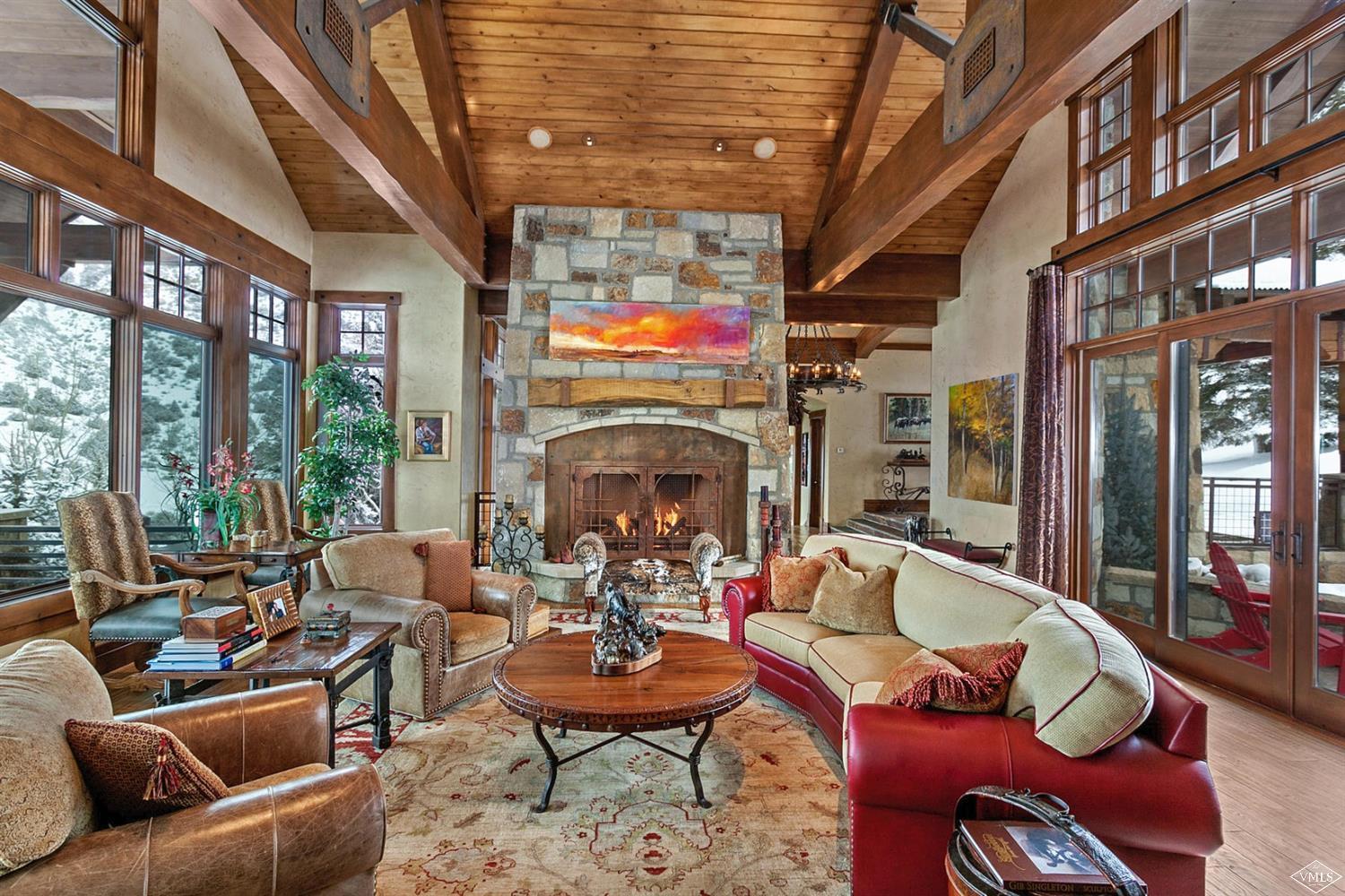 605 Andorra Road Edwards, CO 81632 - Photo 5 of 25 a living room with furniture fireplace and a large window