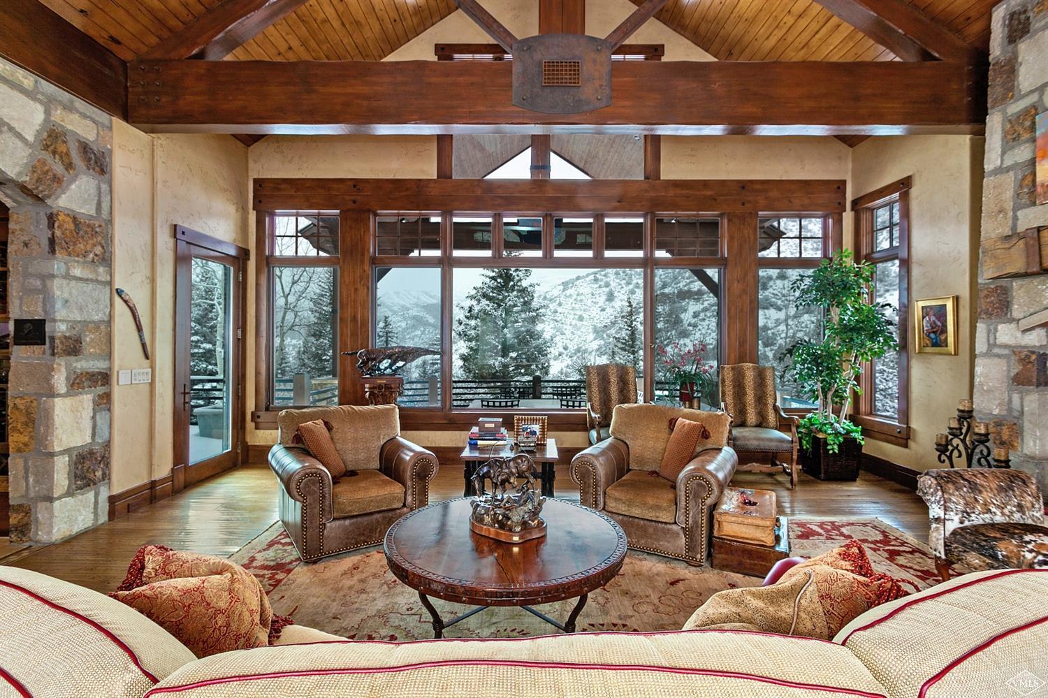 605 Andorra Road Edwards, CO 81632 - Photo 6 of 25 a living room with patio furniture and a potted plant