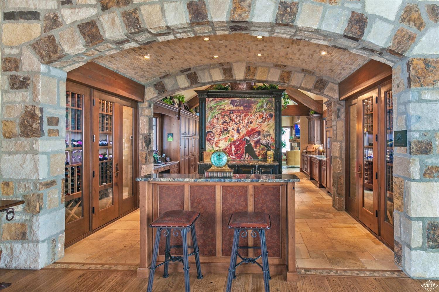 605 Andorra Road Edwards, CO 81632 - Photo 7 of 25 a dining room with furniture and a chandelier