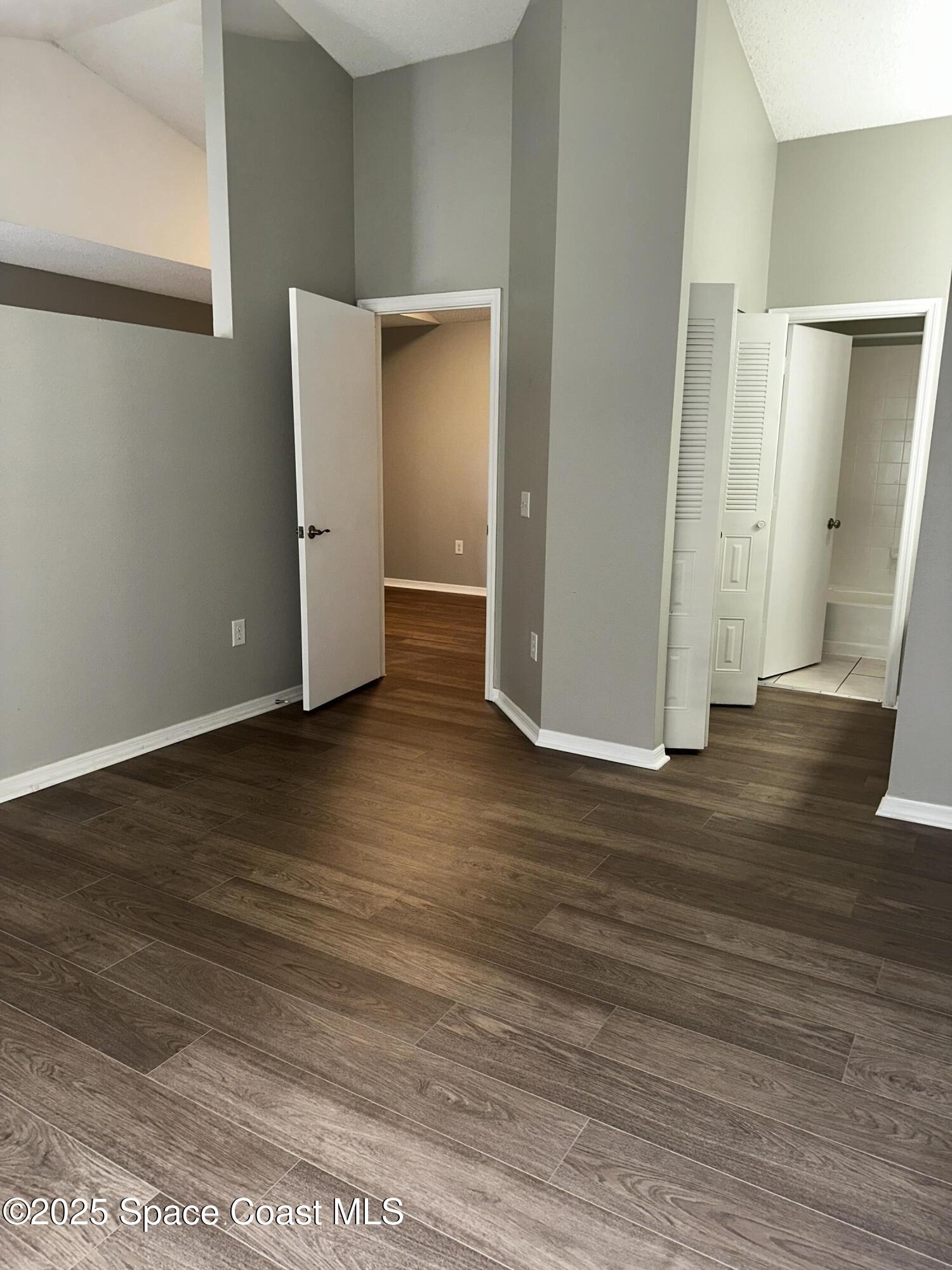 723 Players Court Melbourne, FL 32940 - Photo 11 of 15 a view of a room with wooden floor