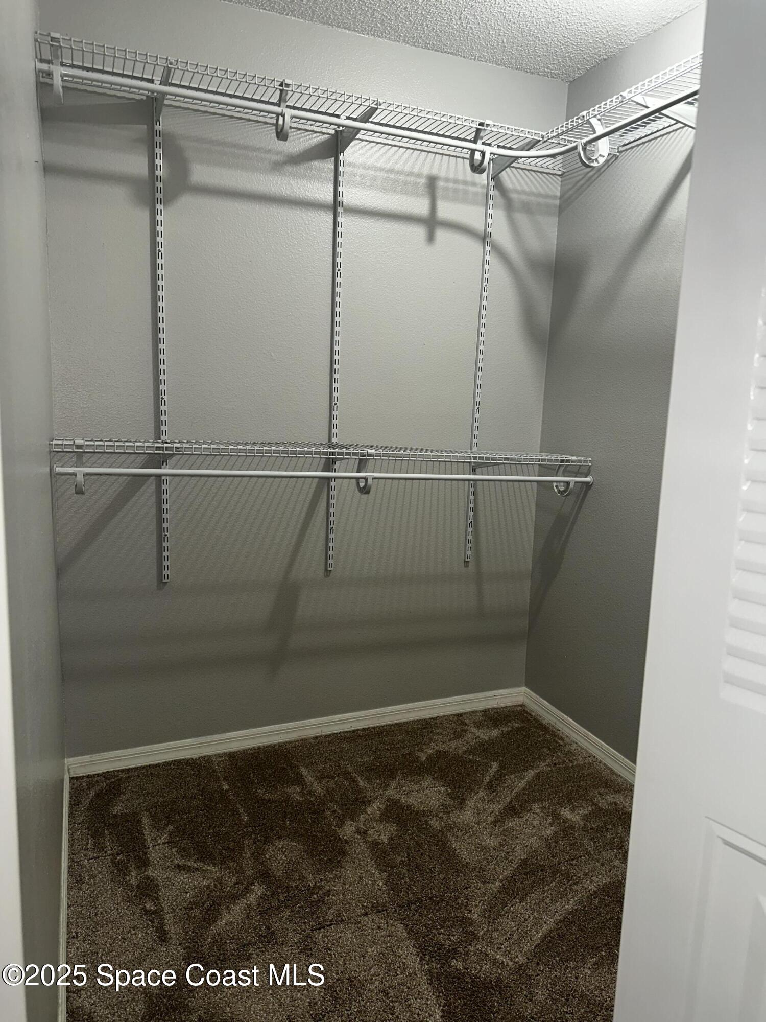 723 Players Court Melbourne, FL 32940 - Photo 13 of 15 a view of walk in closet