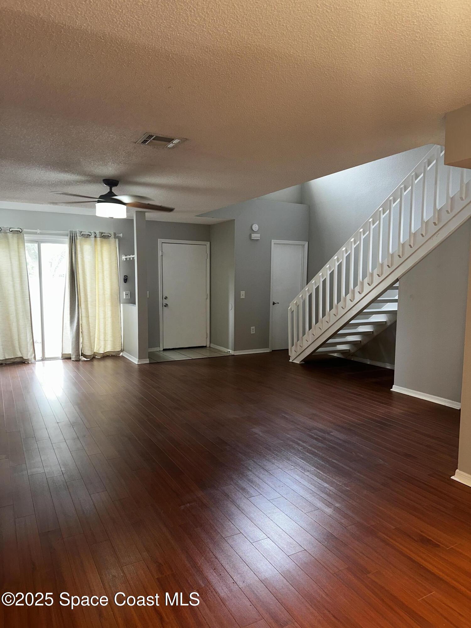 723 Players Court Melbourne, FL 32940 - Photo 4 of 15 a view of entryway with wooden floor