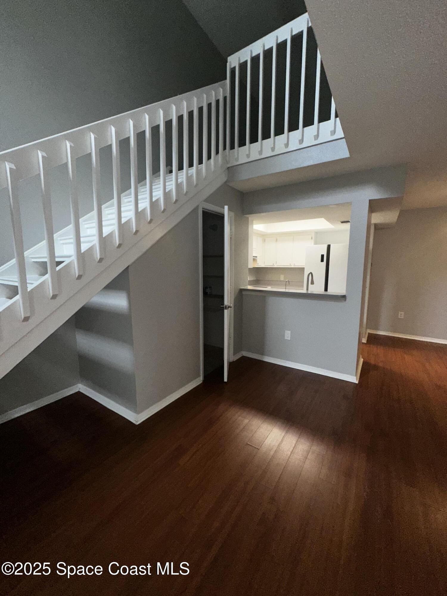 723 Players Court Melbourne, FL 32940 - Photo 5 of 15 a view of a living room with hardwood floor