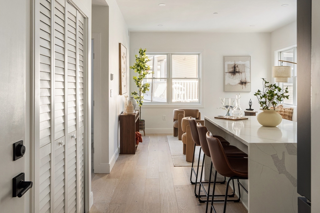 140 Shirley Street, Unit 204 Winthrop, MA 02152 - Photo 16 of 21 a view of a dining room with furniture and window