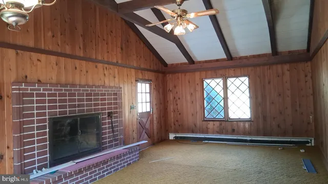a large kitchen with a sink and cabinets