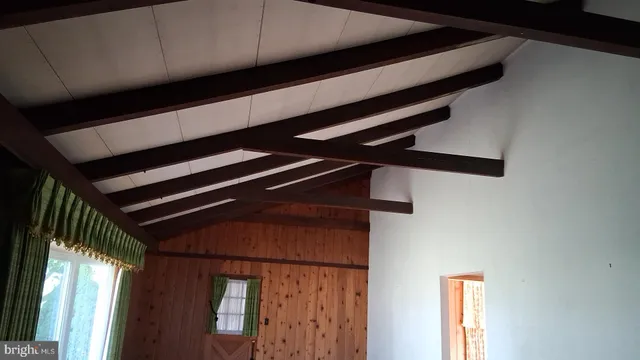 a bathroom with a shower and a sink