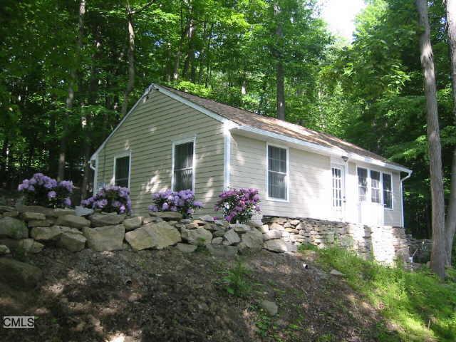 16 7th Lane Ridgefield, CT 06877 - Photo 1 of 1 a view of a house with yard and garden