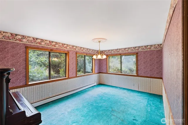 a bathroom with a sink toilet and mirror