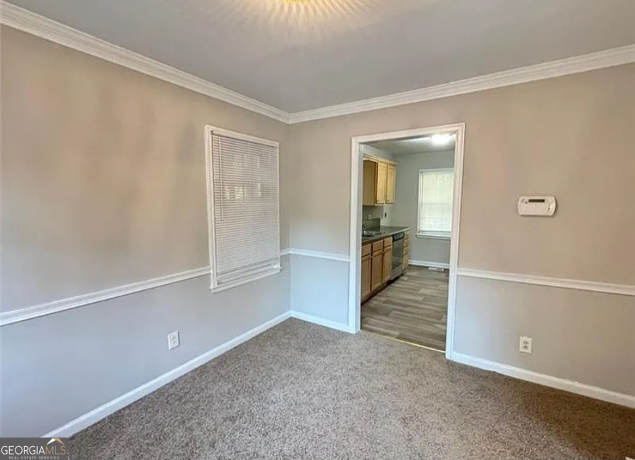 1589 Pinehurst Drive Southwest Atlanta, GA 30311 - Photo 4 of 10 wooden floor in an empty room