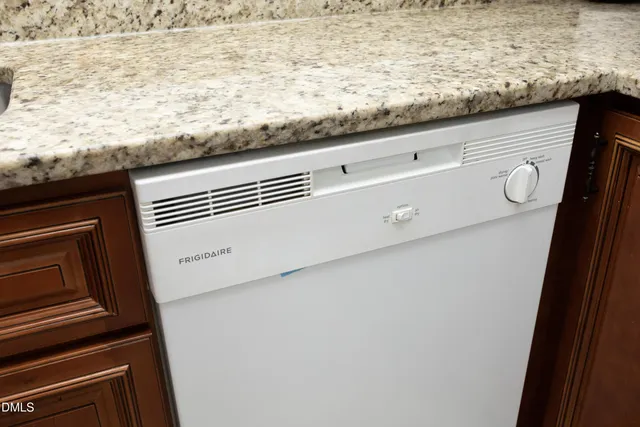 a view of kitchen and wooden floor