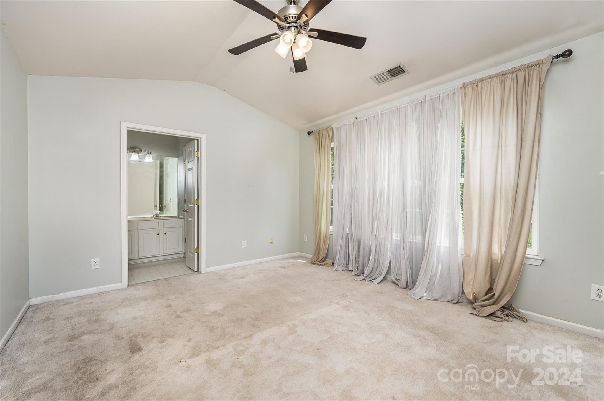 6604 Rothchild Drive Charlotte, NC 28270 - Photo 15 of 32 wooden floor in an empty room with a window