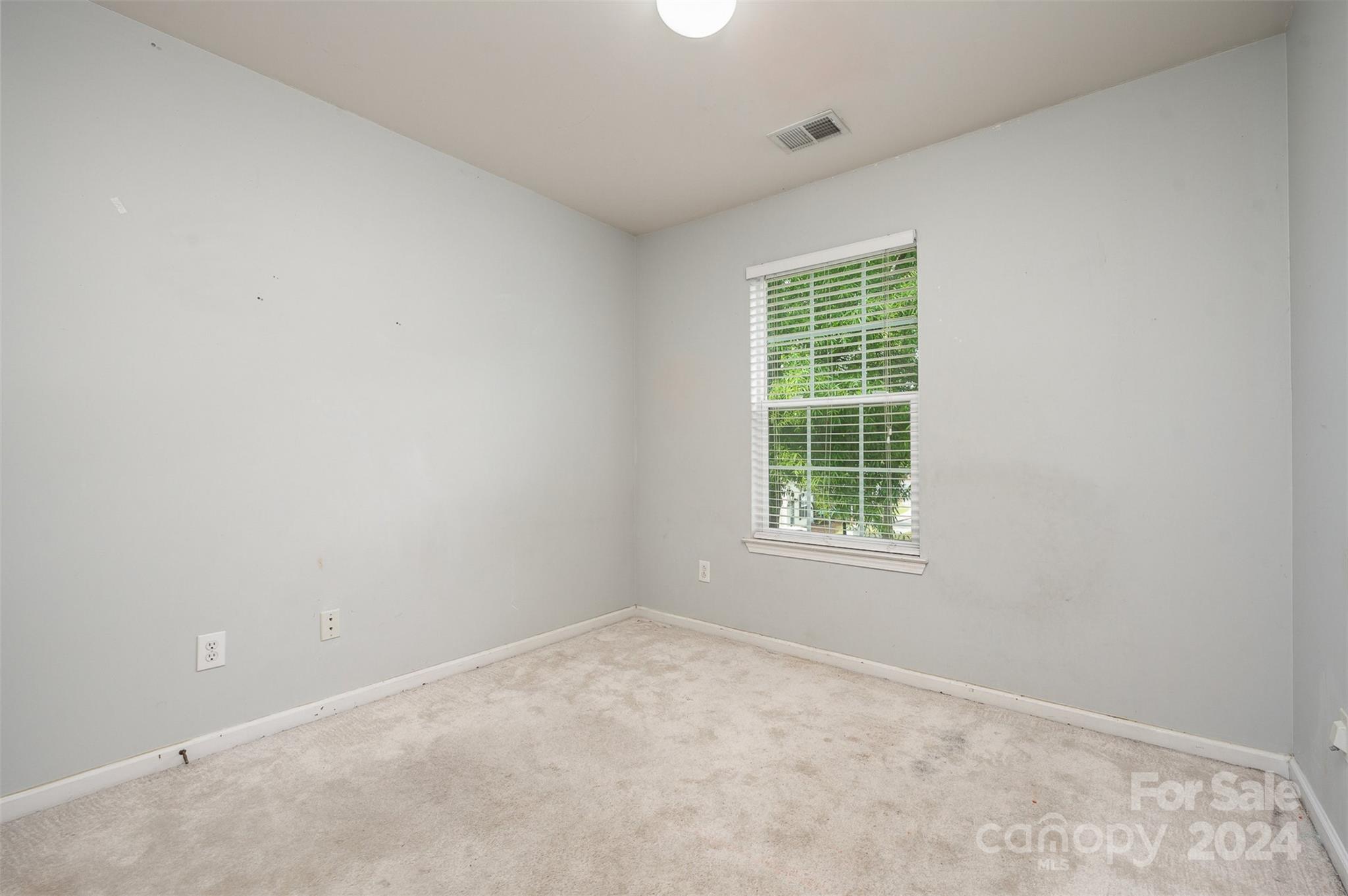 6604 Rothchild Drive Charlotte, NC 28270 - Photo 21 of 32 an empty room with a window