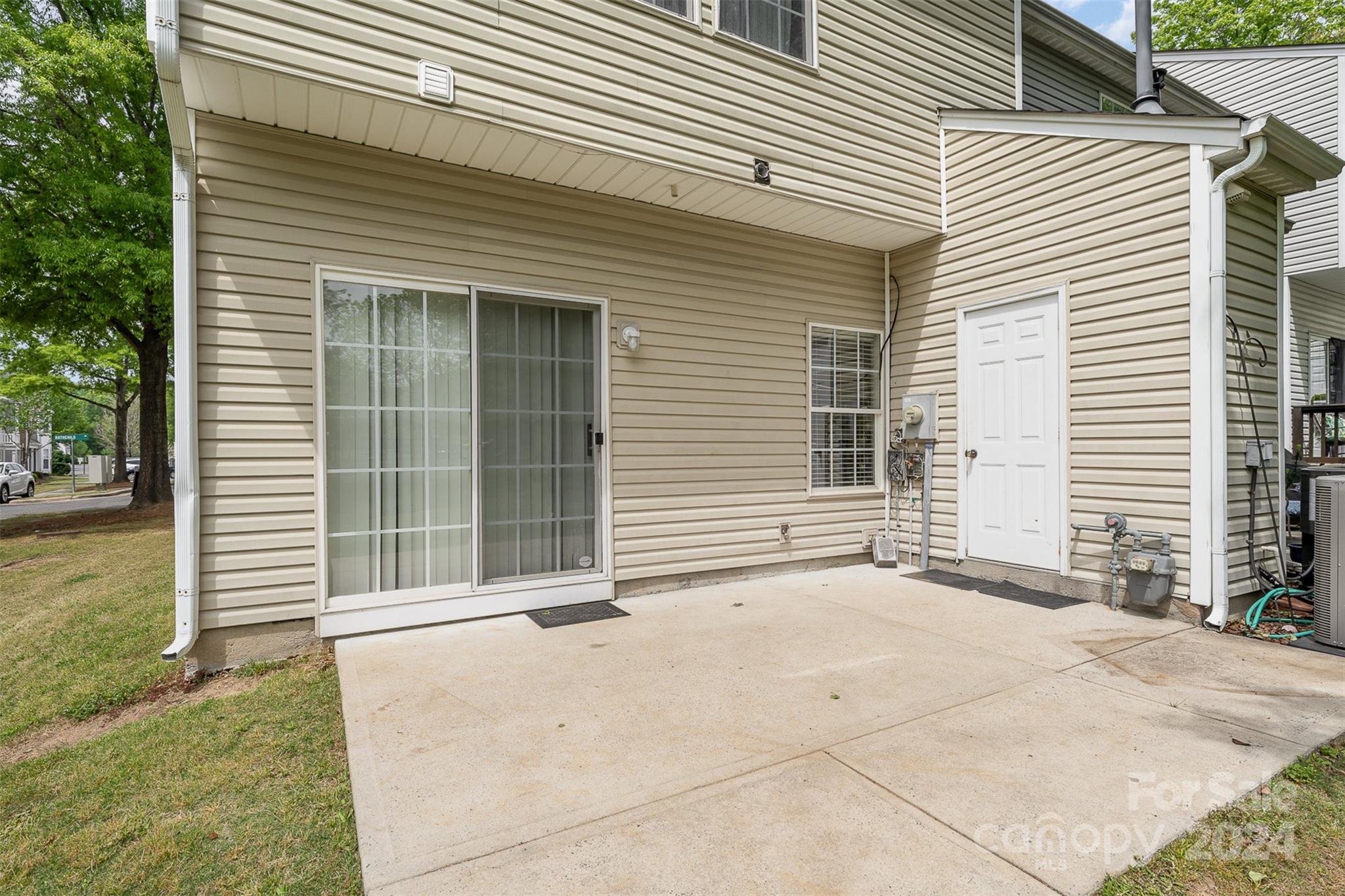 6604 Rothchild Drive Charlotte, NC 28270 - Photo 25 of 32 a view of a house with backyard and garden