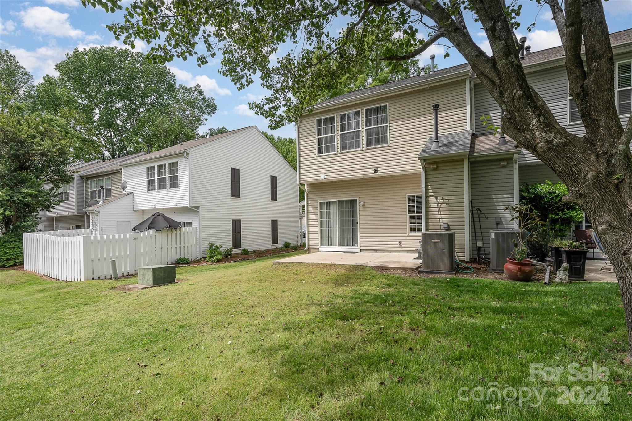 6604 Rothchild Drive Charlotte, NC 28270 - Photo 29 of 32 a front view of house with yard and green space