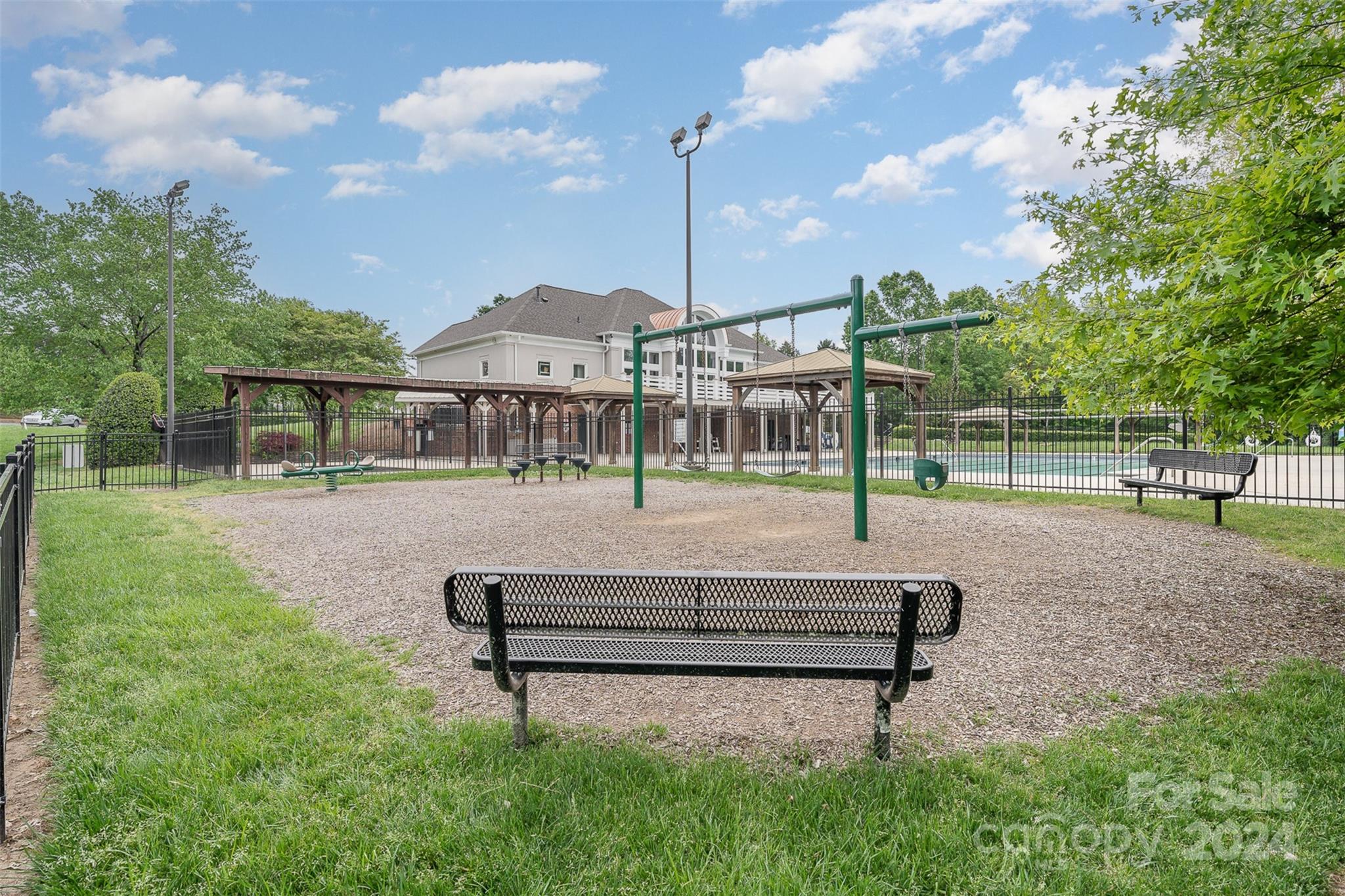 6604 Rothchild Drive Charlotte, NC 28270 - Photo 31 of 32 a park view with a bench