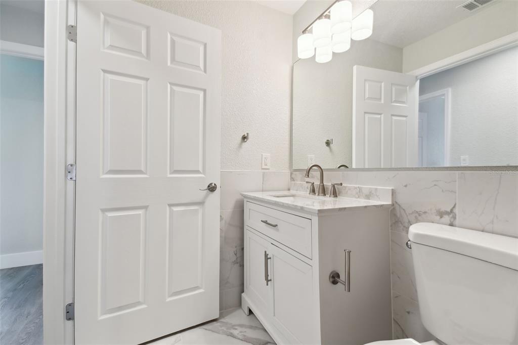 4482 Kingston Drive Hernando Beach, FL 34607 - Photo 30 of 49 a bathroom with a sink and a toilet