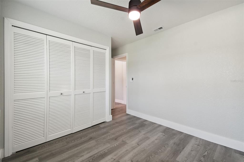 4482 Kingston Drive Hernando Beach, FL 34607 - Photo 36 of 49 wooden floor in an empty room