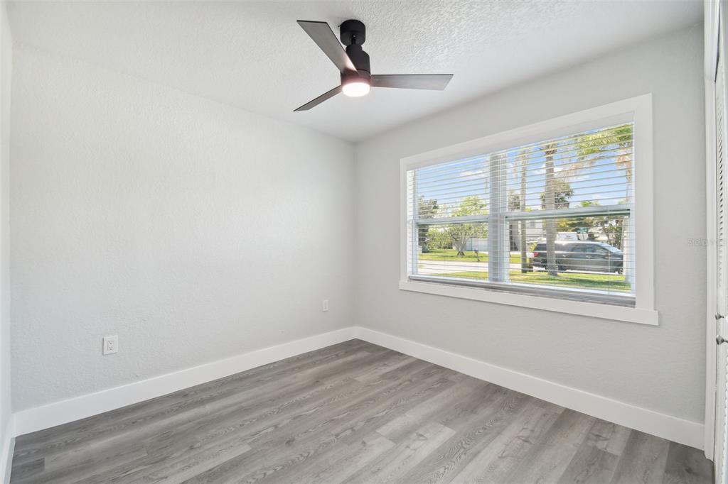 4482 Kingston Drive Hernando Beach, FL 34607 - Photo 37 of 49 a view of an empty room with a window