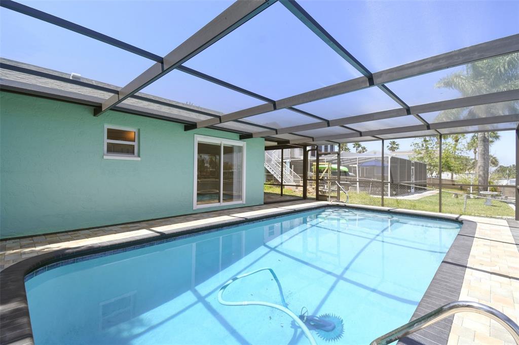 4482 Kingston Drive Hernando Beach, FL 34607 - Photo 40 of 49 a view of an empty room with a window