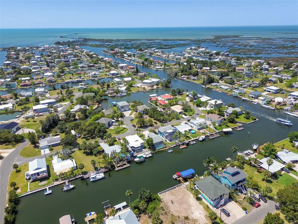 4482 Kingston Drive Hernando Beach, FL 34607 - Photo 4 of 49 an aerial view of a city with ocean view