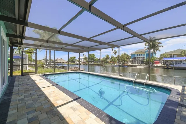 a outdoor view with a swimming pool