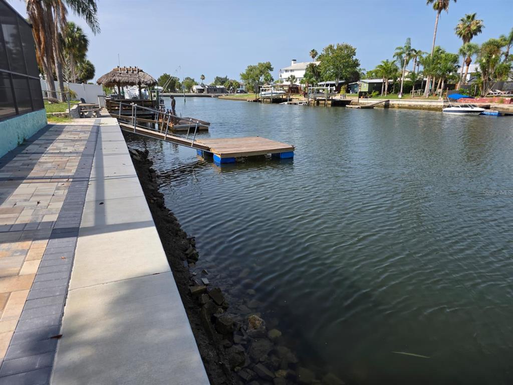 4482 Kingston Drive Hernando Beach, FL 34607 - Photo 48 of 49 a view of swimming pool with outdoor seating