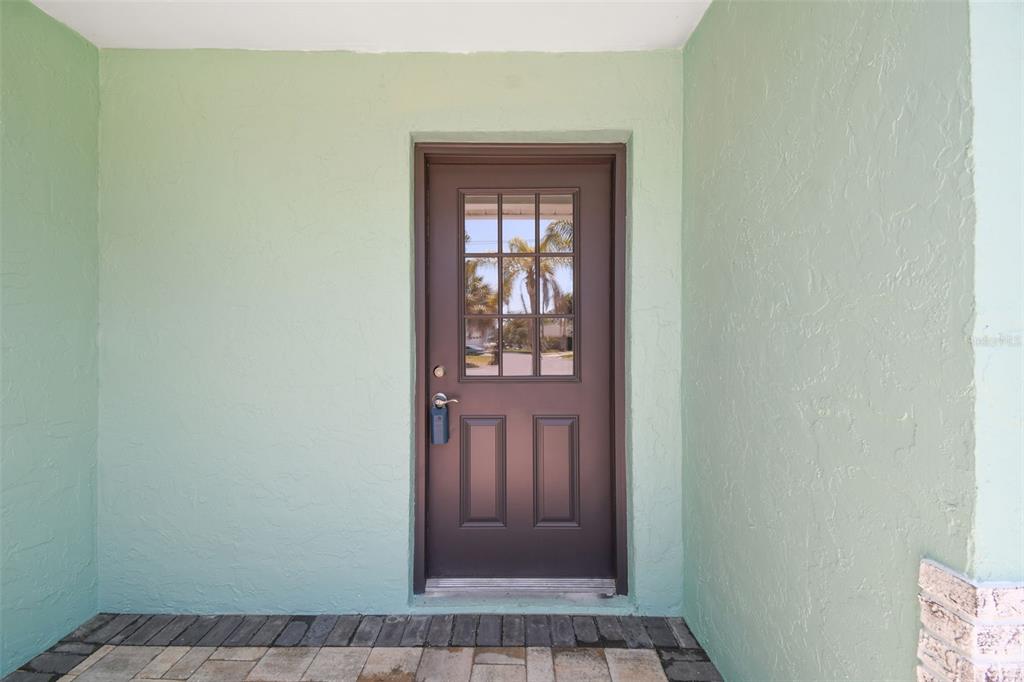 4482 Kingston Drive Hernando Beach, FL 34607 - Photo 8 of 49 a view of an front door