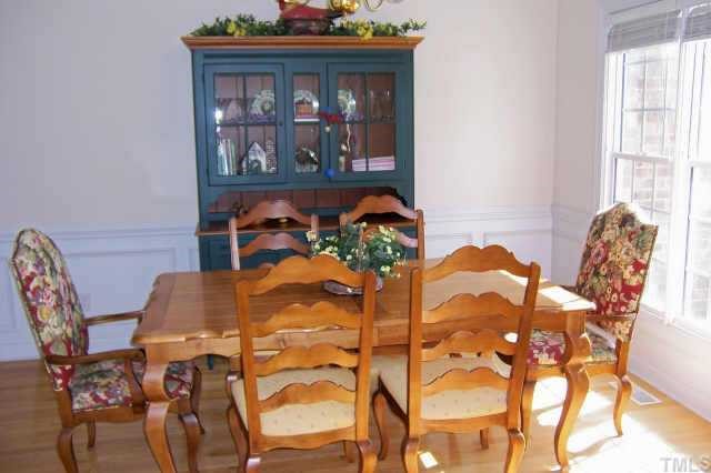 Hardwood flrs accent the light filled dining room