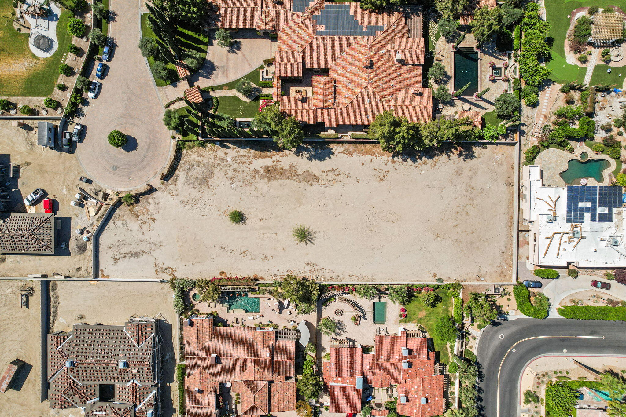 0 Rancho Clancy Rancho Mirage, CA 92270 - Photo 15 of 15 an aerial view of a house with a yard and lake view