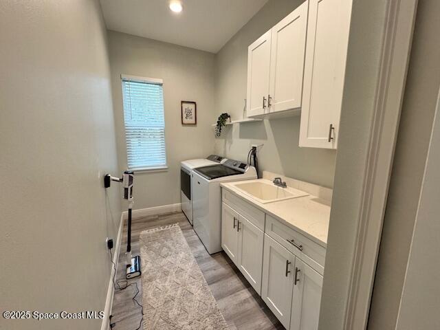 4235 Navel Street Cocoa, FL 32926 - Photo 17 of 24 a kitchen with stainless steel appliances a sink stove and cabinets