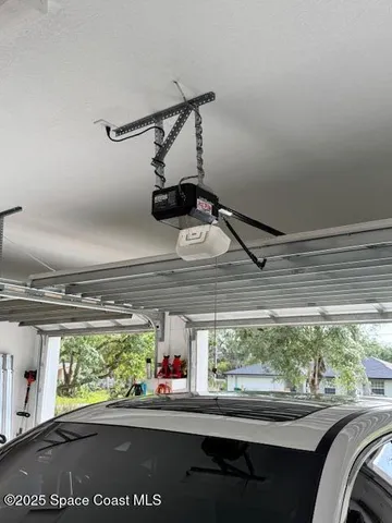 a room with furniture and a large window