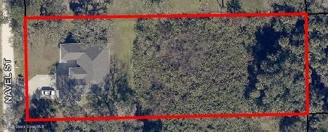 4235 Navel Street Cocoa, FL 32926 - Photo 23 of 24 a view of a flower garden