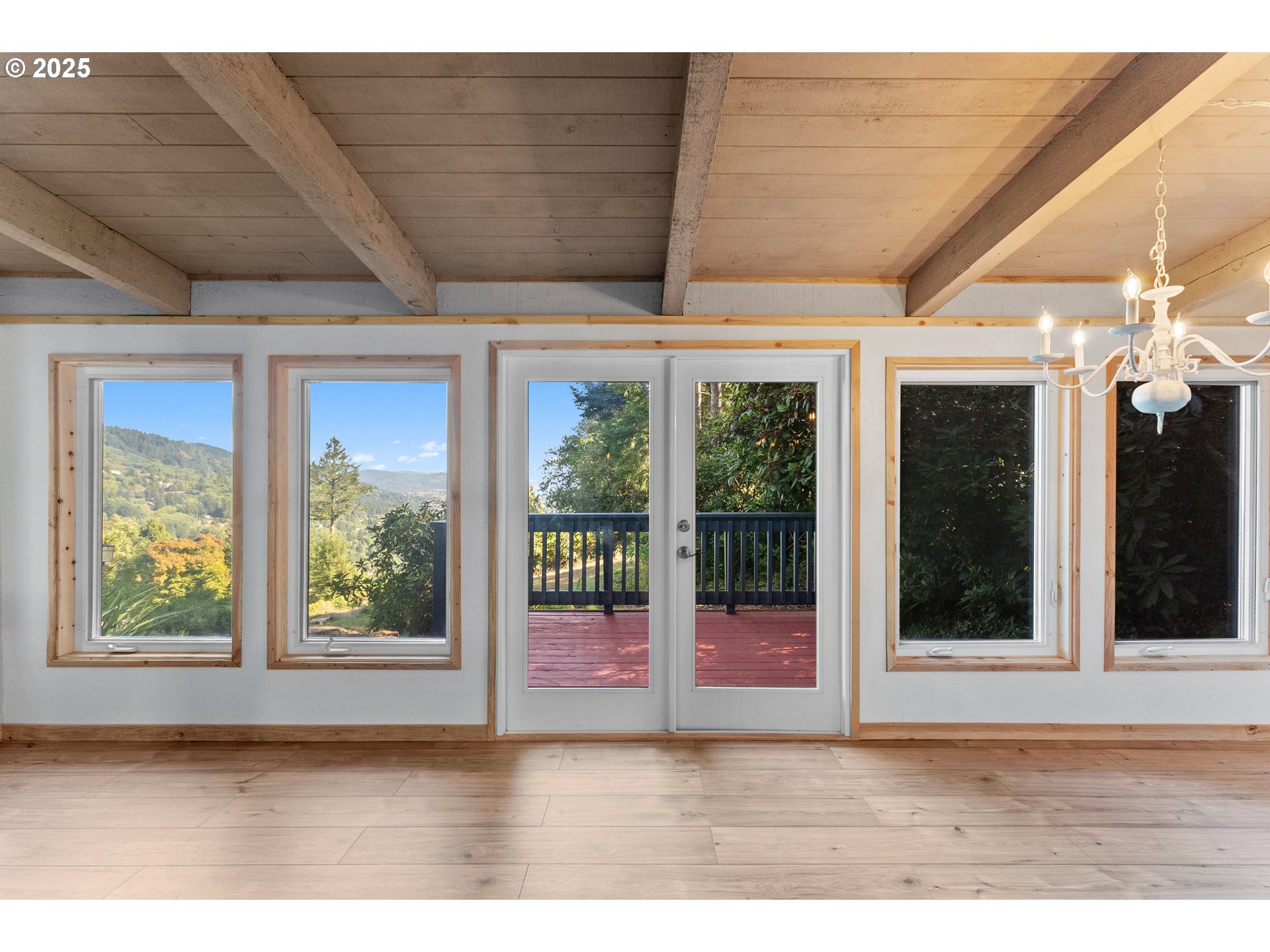 97639 Marina Heights Loop Brookings, OR 97415 - Photo 18 of 27 a view of an entryway with a floor to ceiling window
