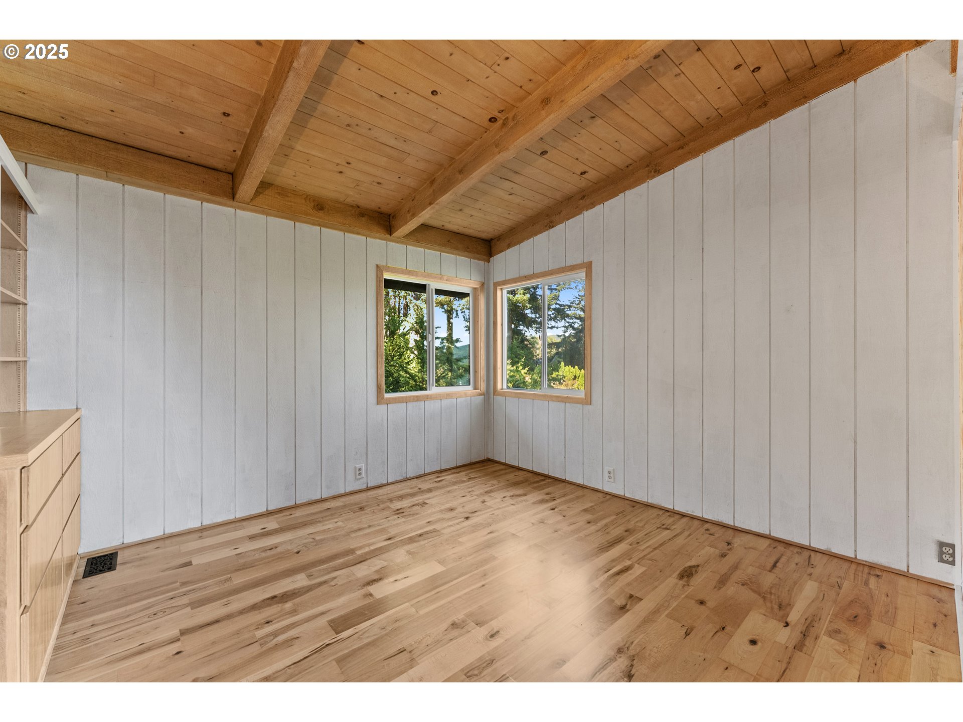 97639 Marina Heights Loop Brookings, OR 97415 - Photo 9 of 27 a view of room with window and hardwood