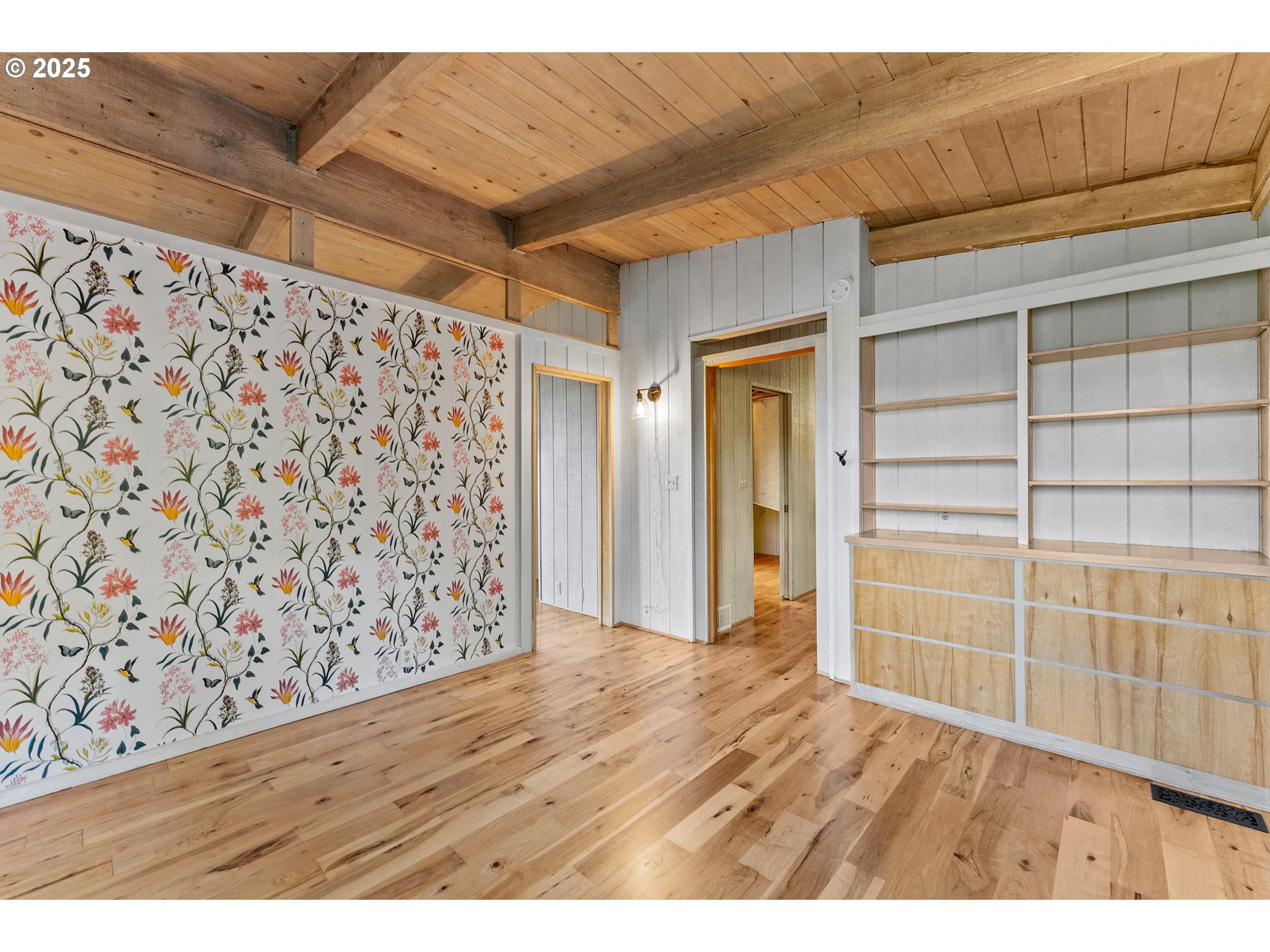 97639 Marina Heights Loop Brookings, OR 97415 - Photo 10 of 27 a view of an empty room with wooden floor and a window