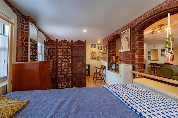 a view of a living room and entry way