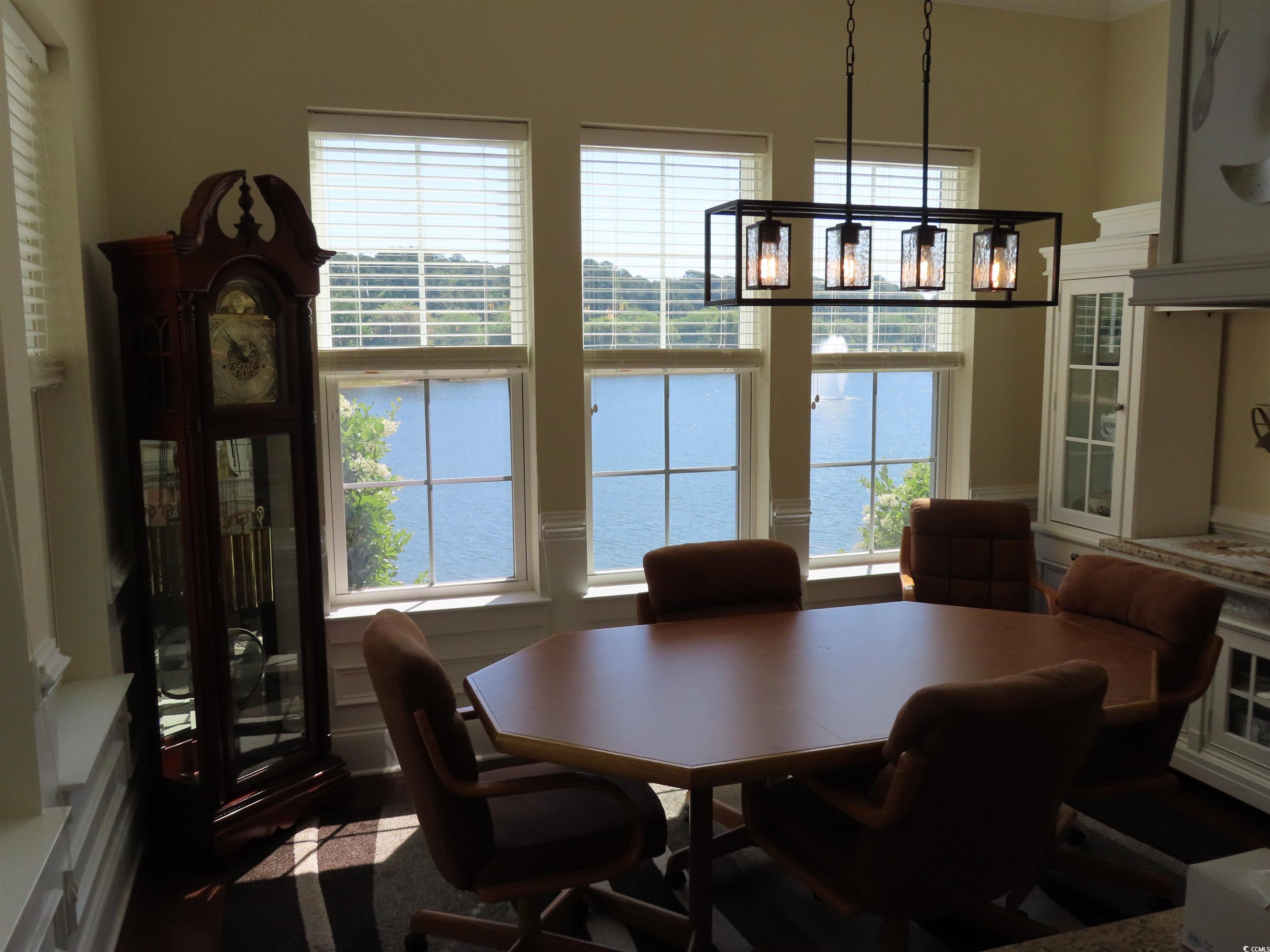 800 Curtis Brown Lane Myrtle Beach, SC 29577 - Photo 15 of 40 Dining space featuring a chandelier