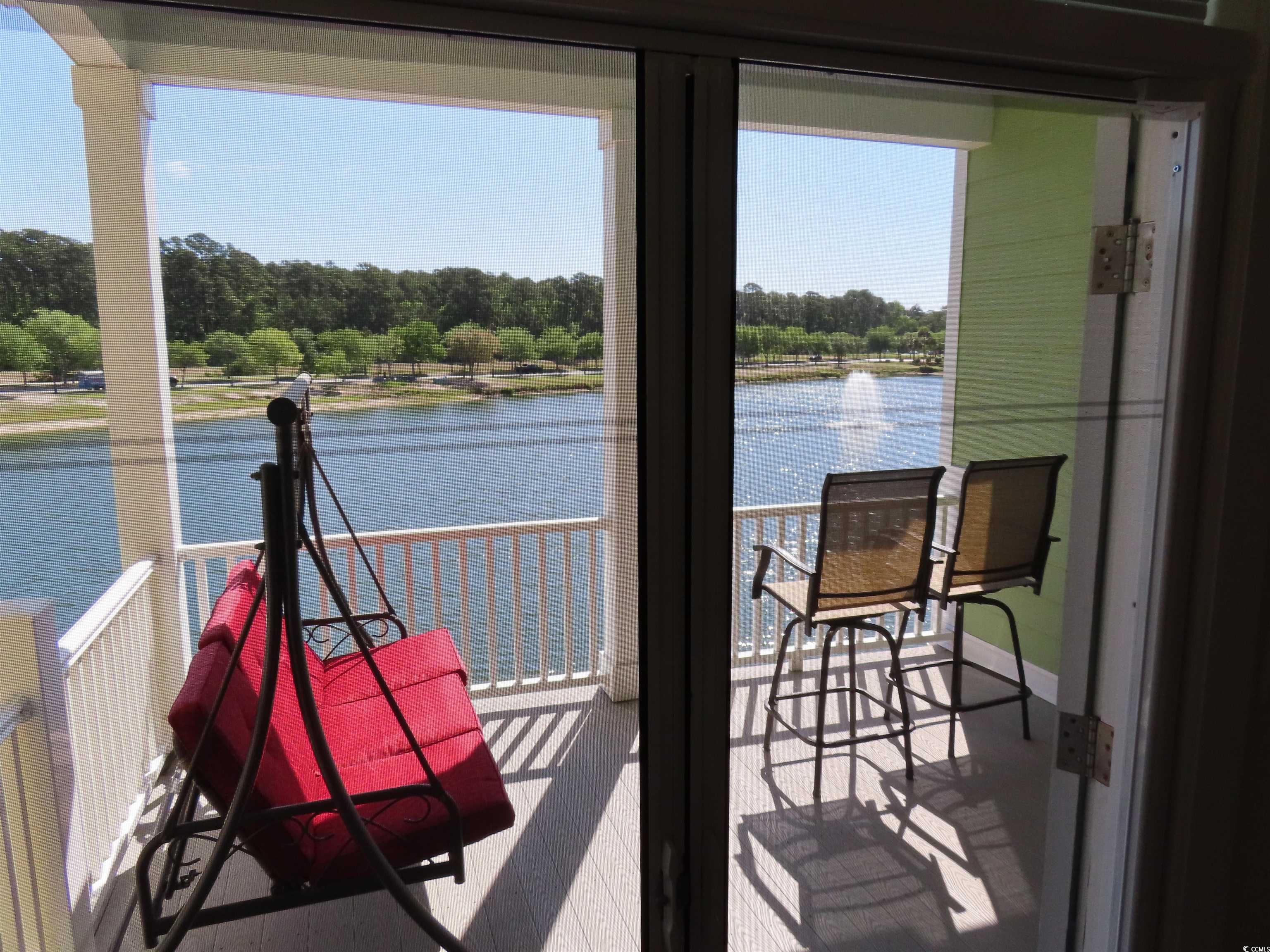 800 Curtis Brown Lane Myrtle Beach, SC 29577 - Photo 23 of 40 Balcony featuring a water view and view of scattered trees