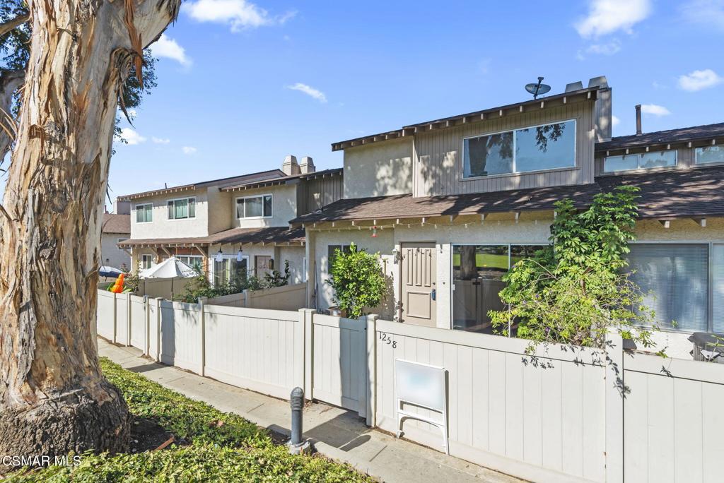 1258 Ramona Drive Newbury Park, CA 91320 - Photo 1 of 51 a view of a building with a garden