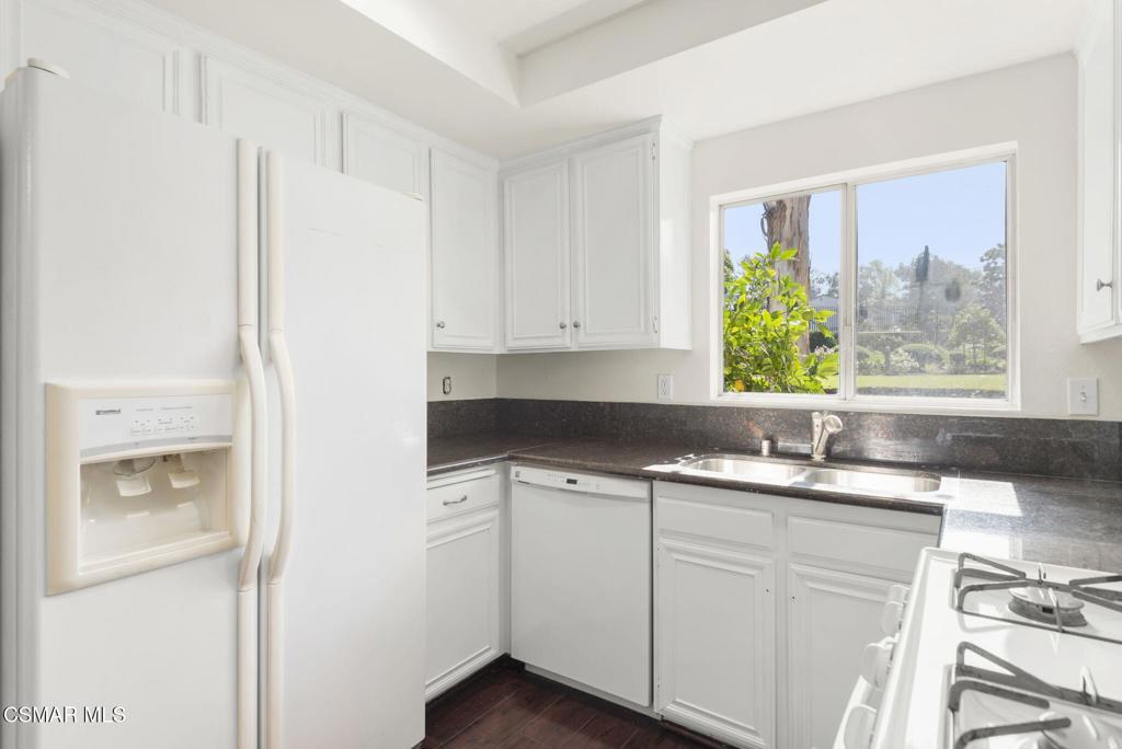 1258 Ramona Drive Newbury Park, CA 91320 - Photo 15 of 51 a kitchen with a sink cabinets and window