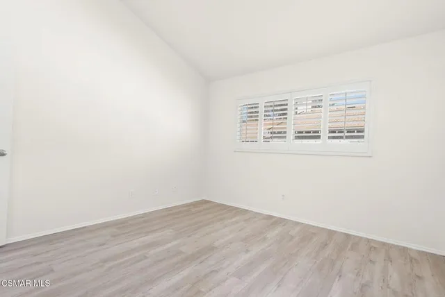 a view of small space with racks on the wall